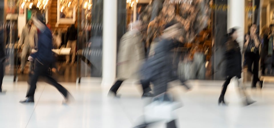 A group of shoppers in a shopping centre 